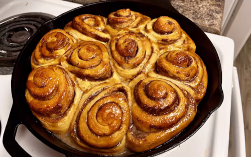 Soft sourdough cinnamon rolls with icing
