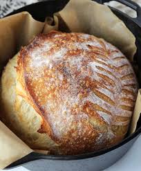 Fresh sourdough loaf ready to cool and slice