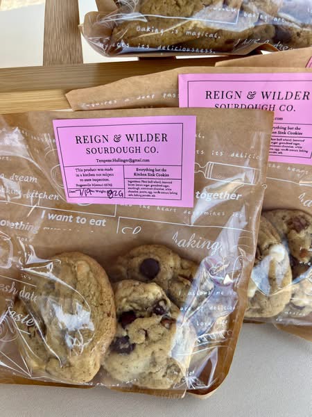 Close-up of cookies in a basket at a Reign and Wilder event table