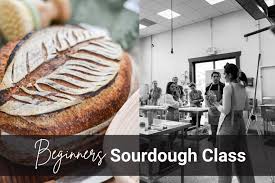 Baker teaching a small sourdough class in person