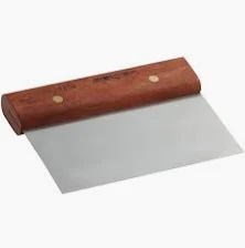 Metal bench scraper used for dividing and shaping sourdough dough